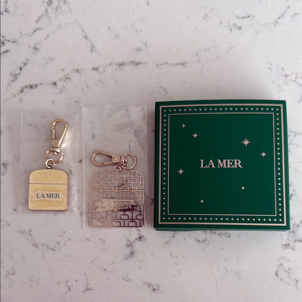 La Mer Hairclip and Gold and Silver Keychain Duo
